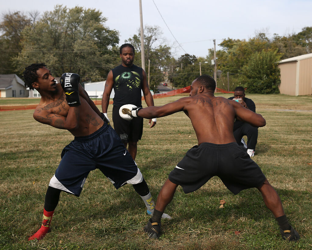 Marques Thorpe Sr. leans away from a punch thrown by Juston Sharp